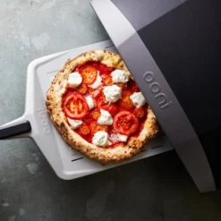 Pizzaspade m/perforert blad 65,5x30,5 cm