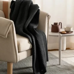Pleeace pledd 140x170 cm svart