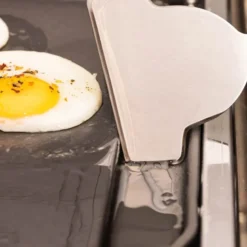 Skrape til stekeplate 25 cm rustfritt stål